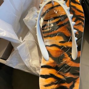 *New Louboutin flip flops